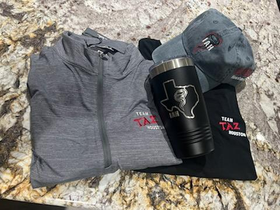 Branded Team TAZ apparel, hat, and tumbler used to reinforce employee identity